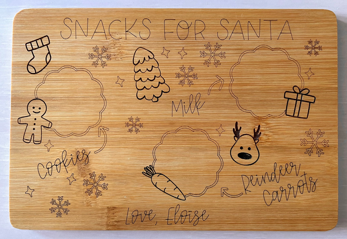 Bamboo tray scored and engraved with Snacks for Santa, personalized with child's name to leave milk, cookies, and carrots for Santa.