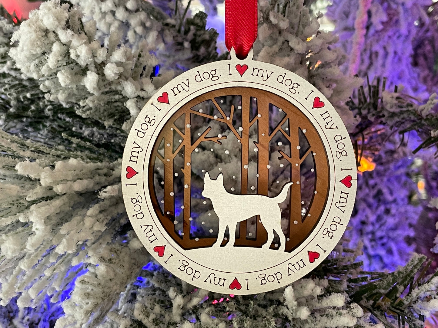 I love my dog ornament hanging from Christmas tree.