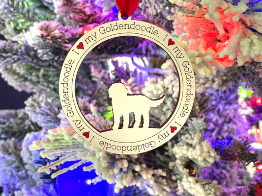 I love my golden doodle dog ornament hanging on Christmas tree.