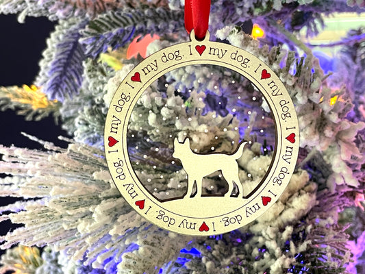 I love my dog ornament hanging from Christmas tree.