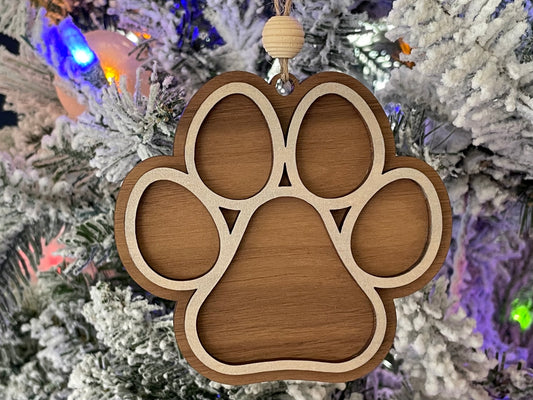 Wooden Dog Paw hanging on Christmas Tree.